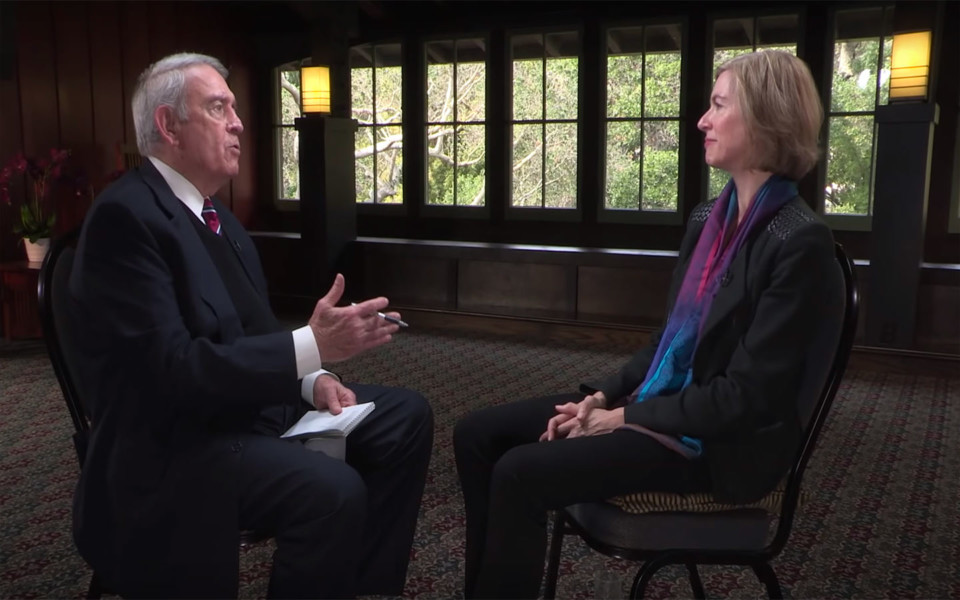 Photo of Dan Rather interviewing Dr. Jennifer Doudna about CRISPR gene editing