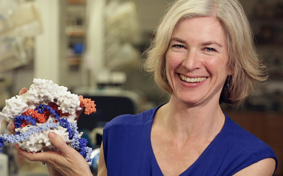 Image of Doudna holding a model of CRISPR