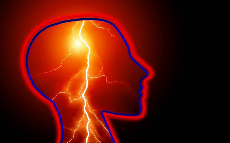 Illustration of lightning bolt in outline of human brain