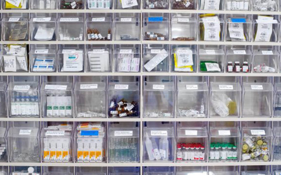 Image of drugs and medical supplies sorted on shelves